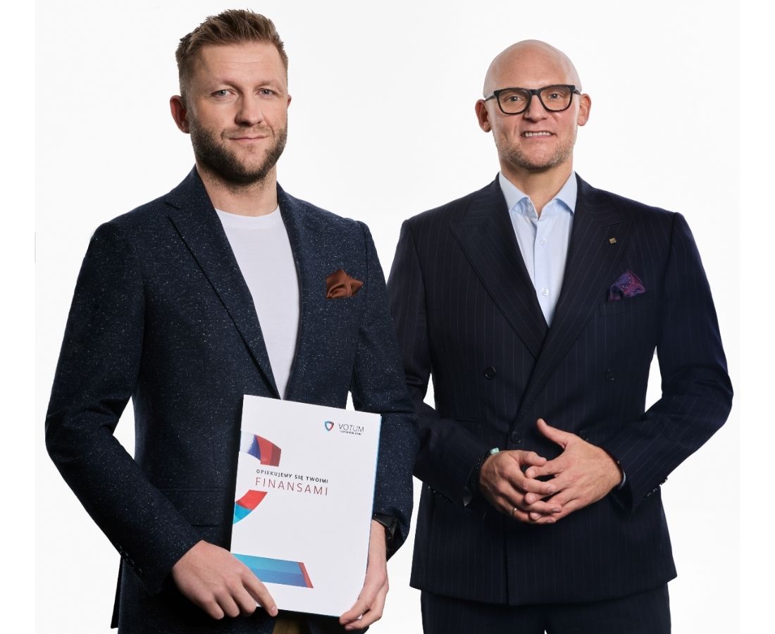 Jakub-Blaszczykowski-Pawel-Wojcik-mobile Jakub Błaszczykowski oraz Paweł Wójcik pozują razem na białym tle.