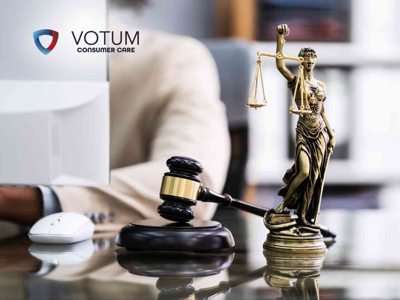 Brand logo 'VOTUM Consumer Care' beside a courtroom gavel and scales statue on a desk, symbolizing legal services.
